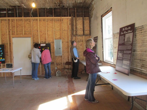 Visitors to the Stewart School exhibit at Stow Historical Society's Harvest Festival, October 4, 2015